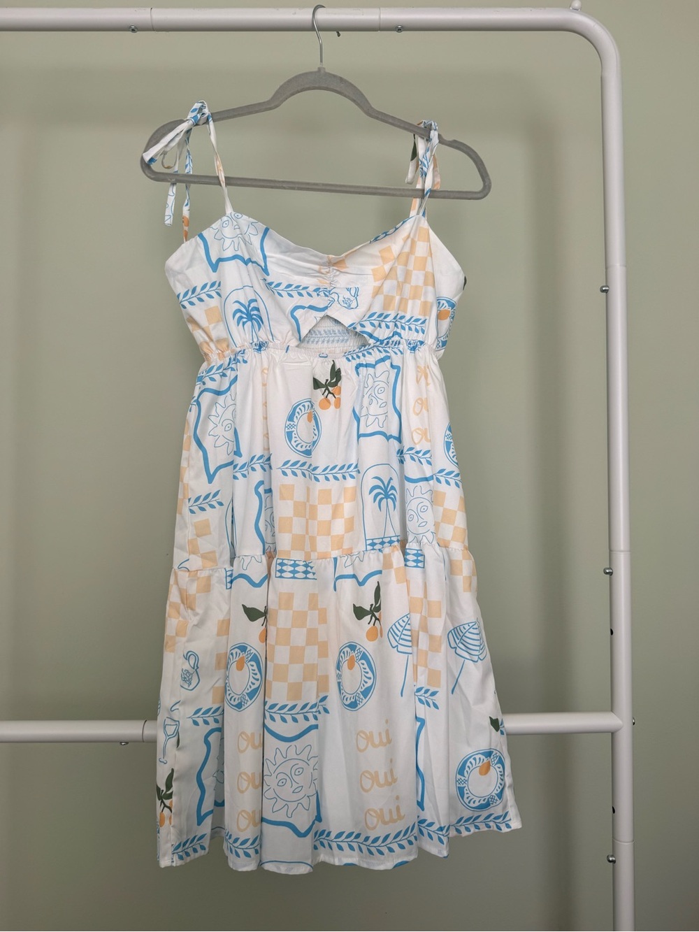 Sleeveless White Midi Dress with Blue & Peach Print